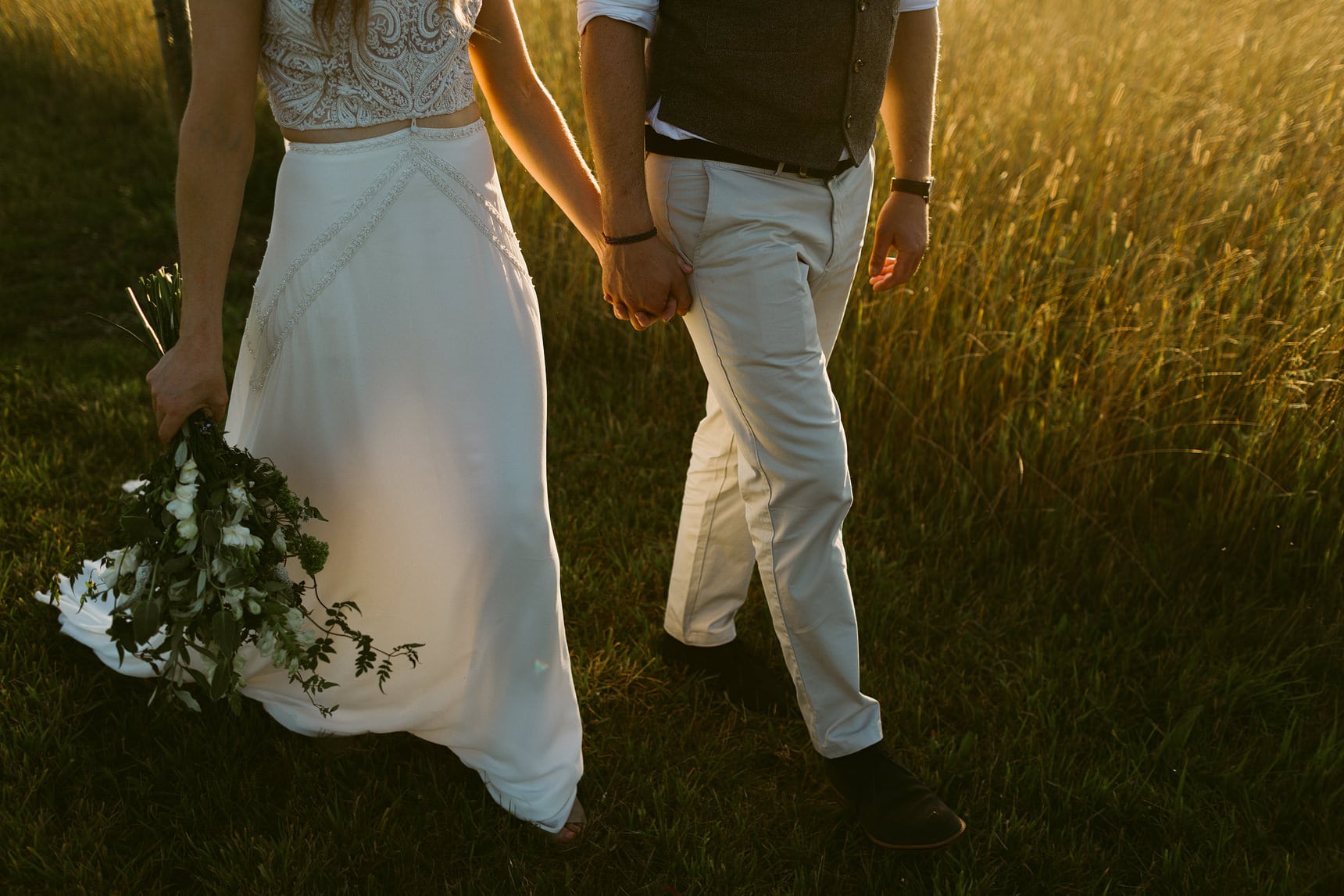 wedding portraits at sunset in field